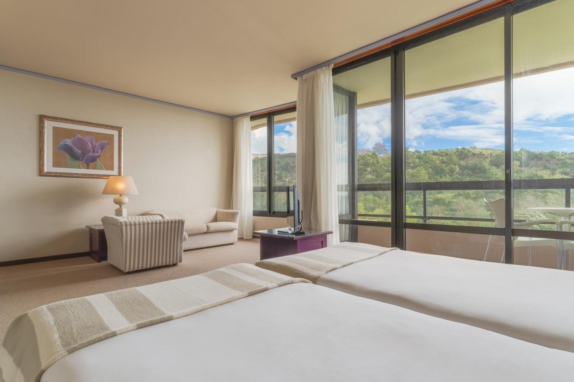 Suite Júnior Tripla com Vista do Jardim